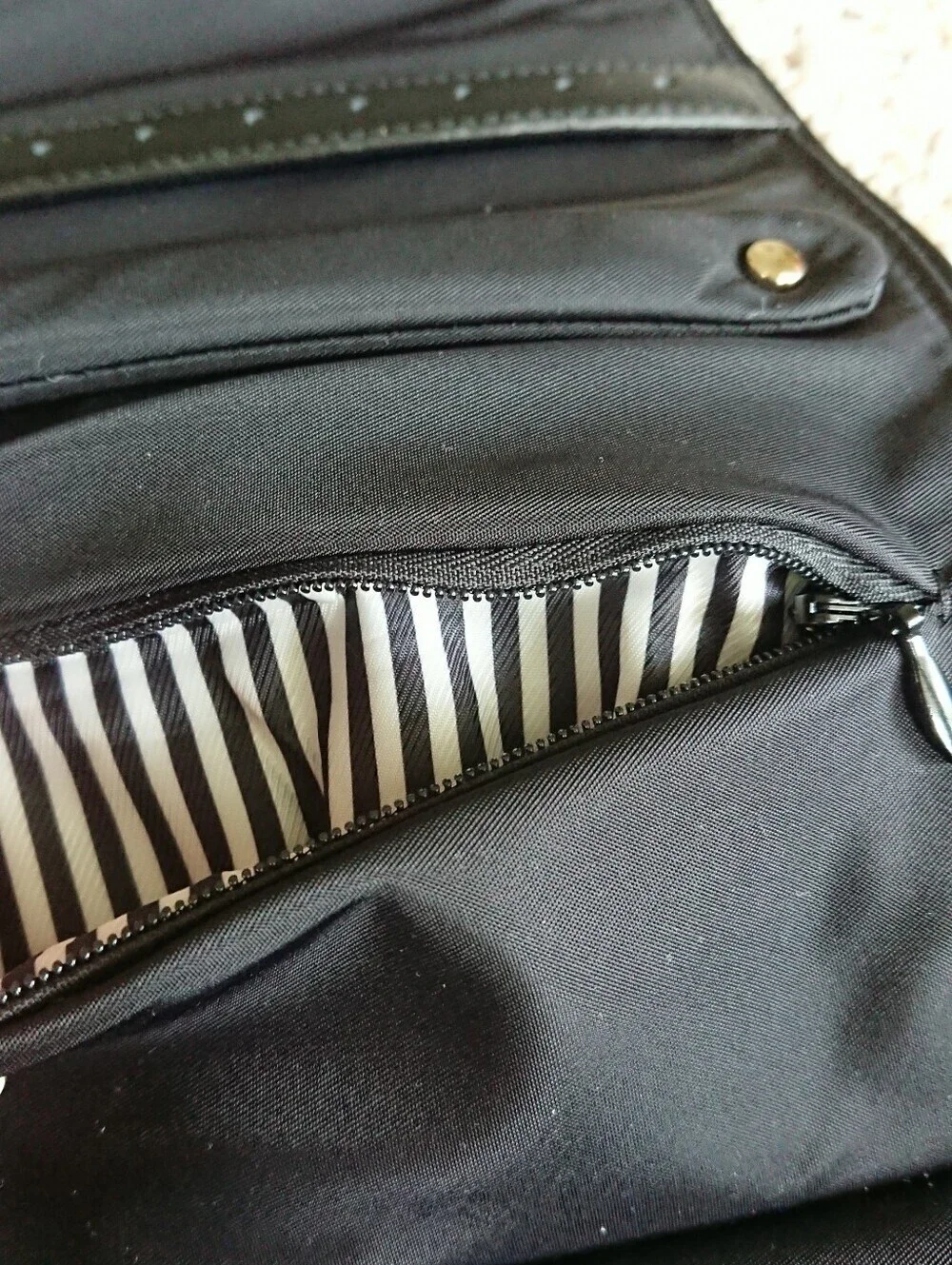 kate spade black nylon zip cosmetic pouch with gold logo